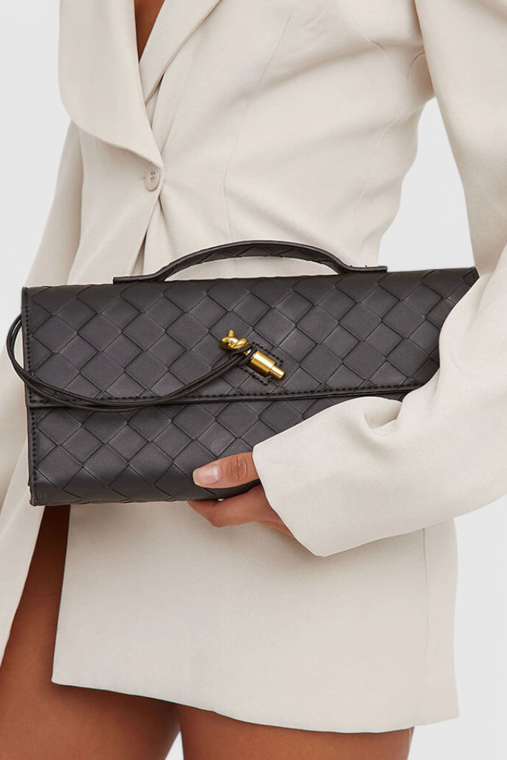 Melania | Bolso Clutch con Nudo Dorado